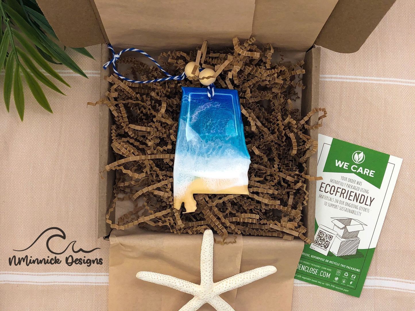 Alabama State Beach Ornament packaged in ecofriendly plastic free materials with recyclable box, tissue paper and paper shred.