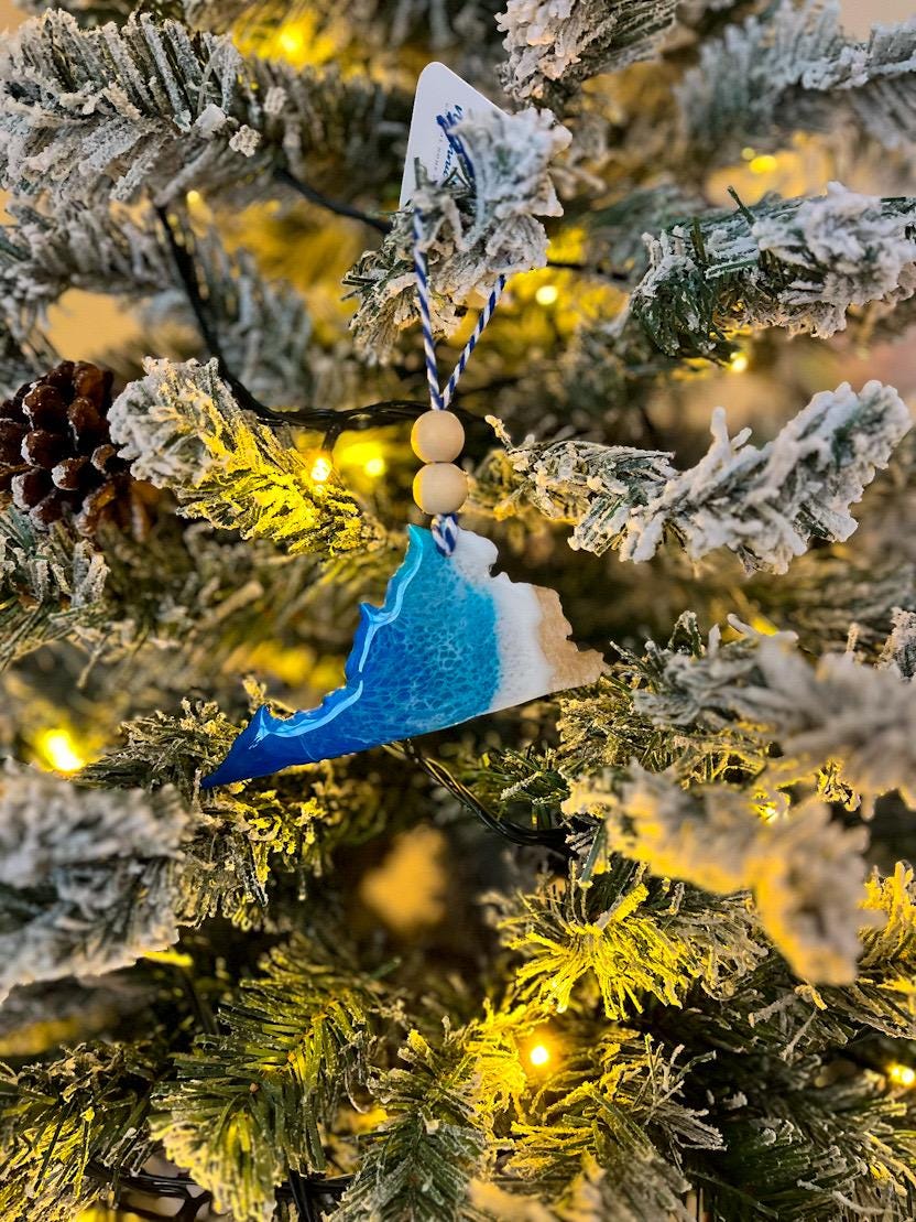 Handmade Virginia shaped wooden ornament featuring ocean resin waves, finished with blue and white twine and two natural wooden beads
