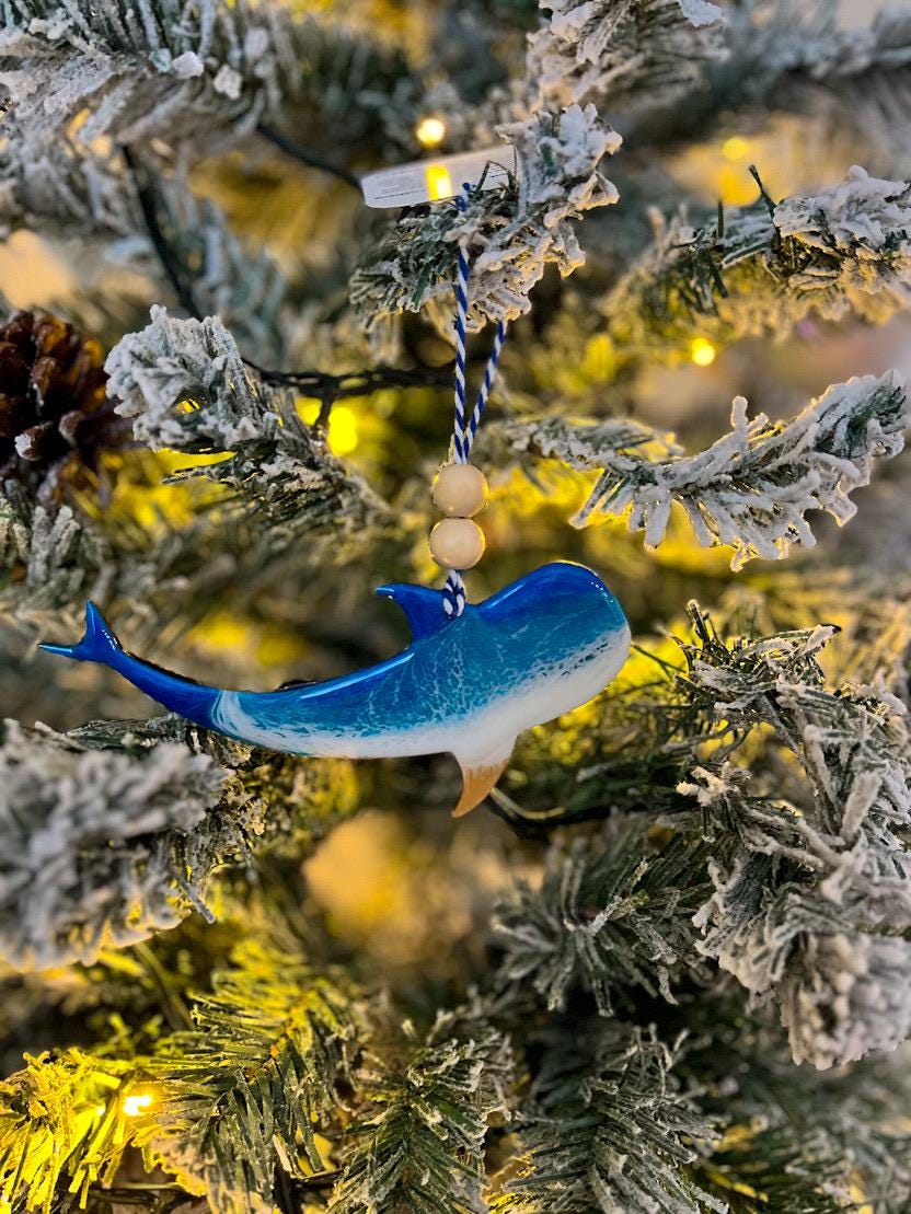 Handmade Whale Shark shaped wooden ornament featuring ocean resin waves, finished with blue and white twine and two natural wooden beads