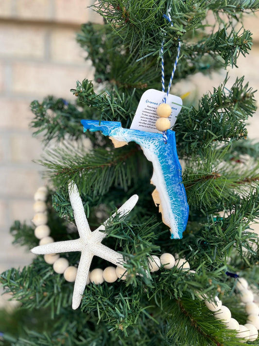 Florida Ornament with ocean resin waves and finished with two wooden beads and blue and white twine