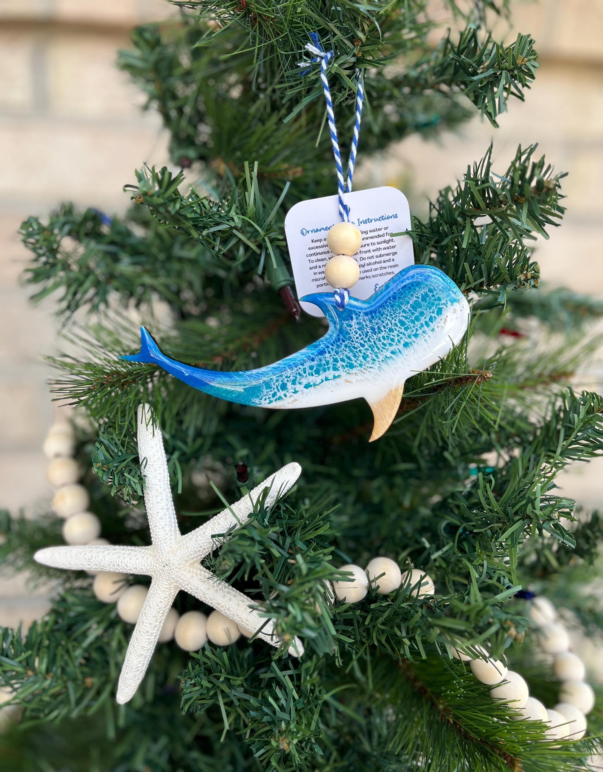 Whale Shark Ornament with ocean resin art and finished with two wooden beads and blue and white twine