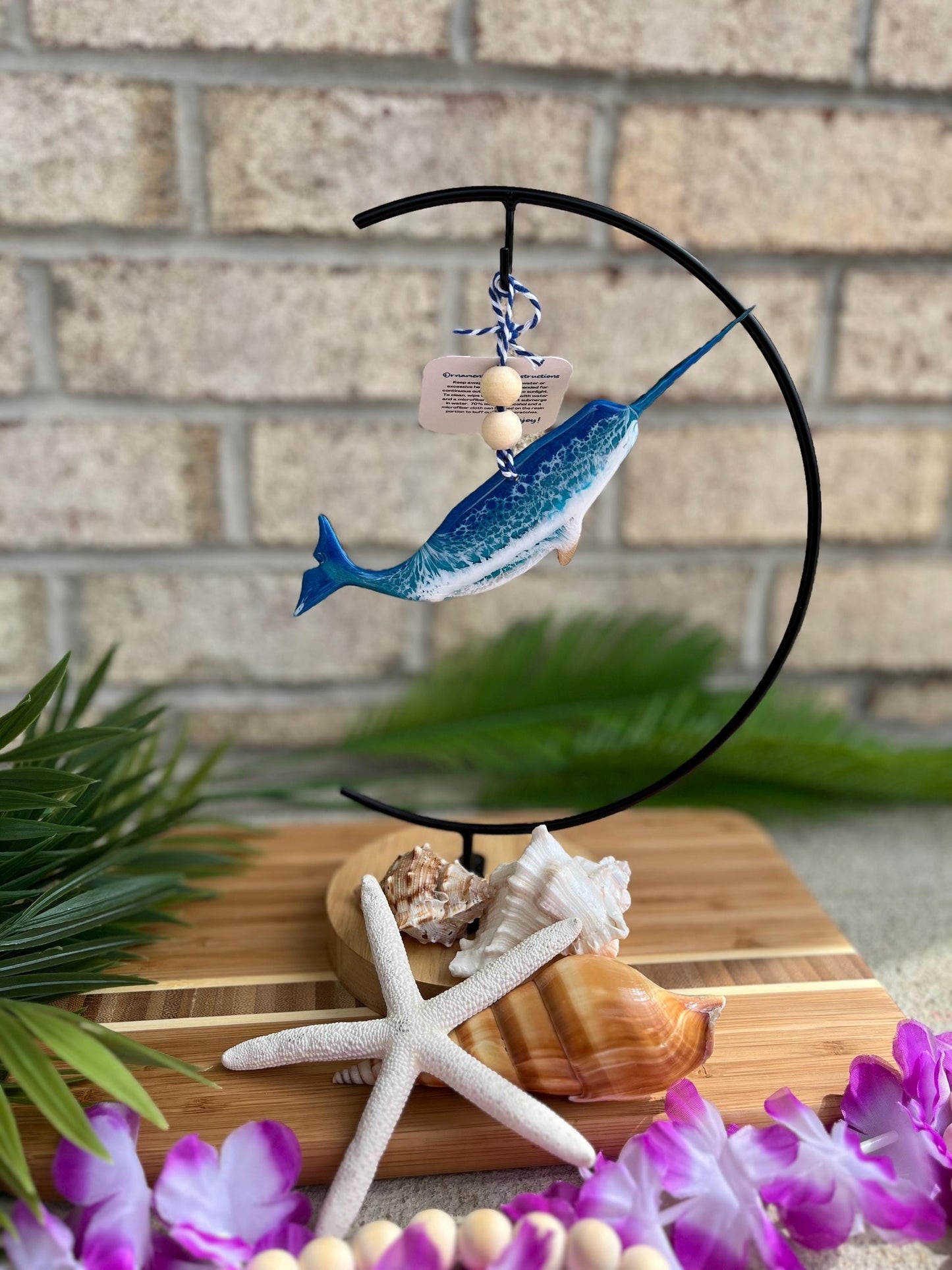Narwhal Ornament hanging on an ornament hook