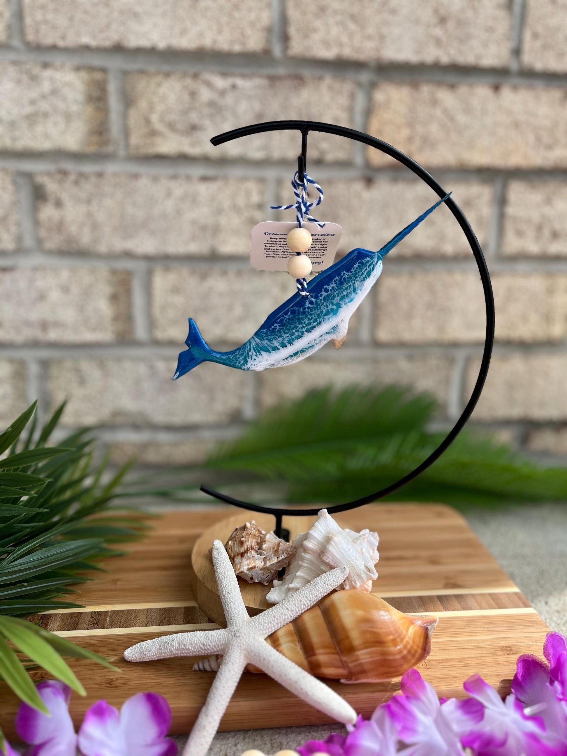 Narwhal Ornament hanging on an ornament hook